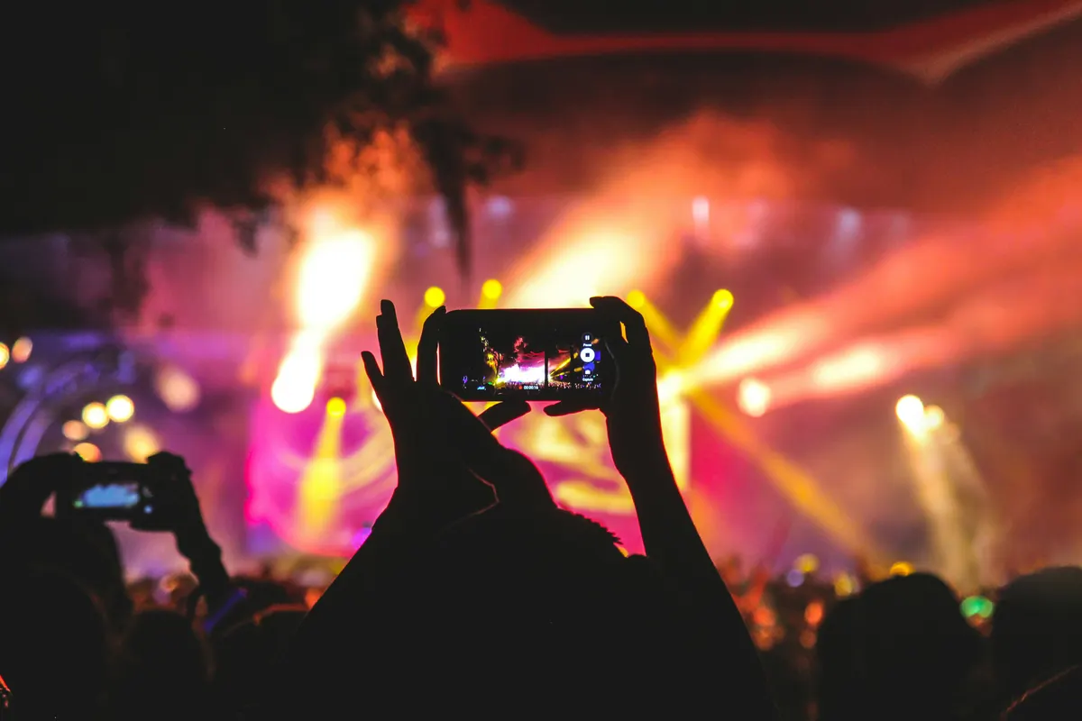 A guest capturing a moment on their phone