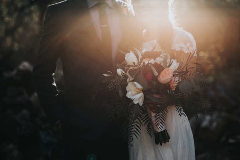 Wedding bouquet held by a couple